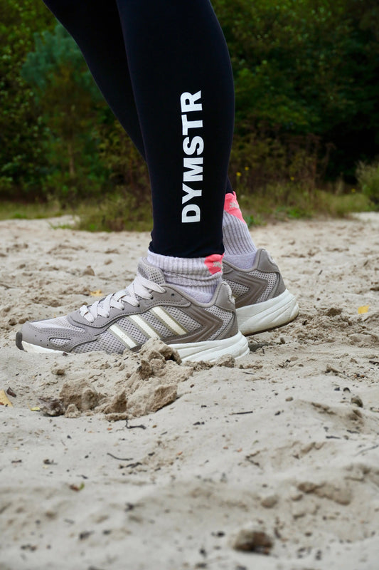 Schwarze Damen Leggins mit weißem Logo Marke DymoStar DYMSTR